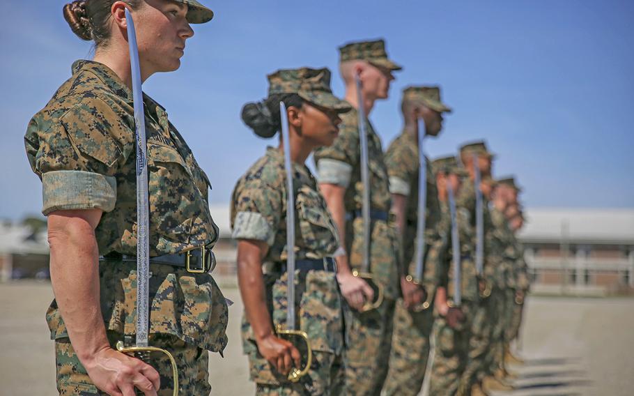 What are the public opinions on a women's military draft in the US?